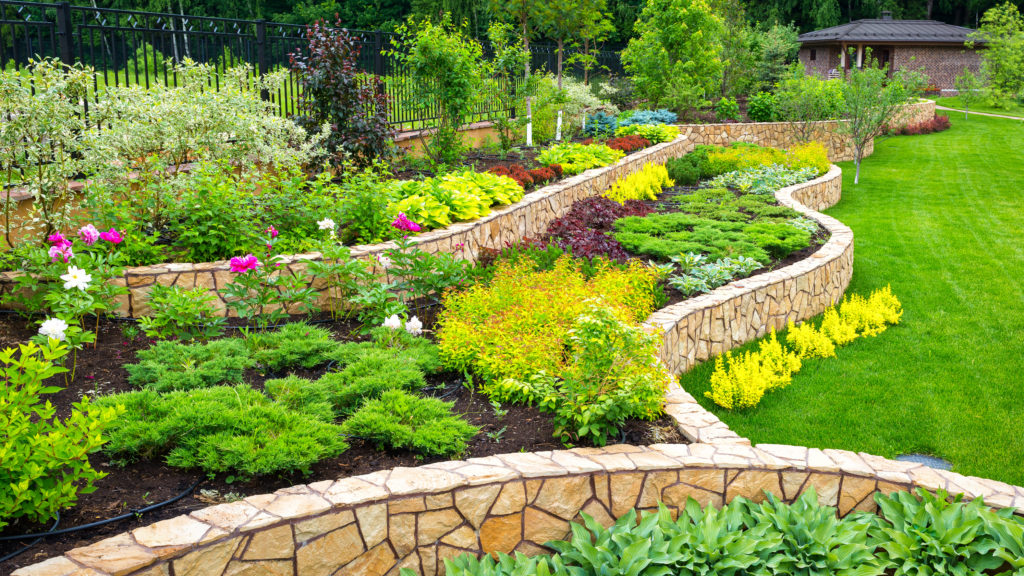 how to stop erosion, yard erosion, stop erosion, retaining wall, retaining walls, backyard retaining wall, boulder wall